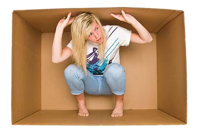 woman captured in cardboard box